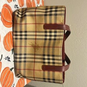 Burberry hand bag red,black,tan with red straps and black interior